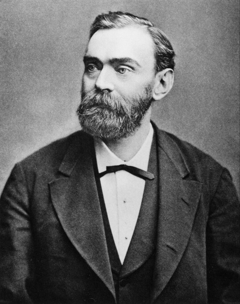 Alfred Nobel, circa 1883. This portrait identifies the prize's founder; it does not document the wording of his will. Source: Wikimedia Commons. Public domain.